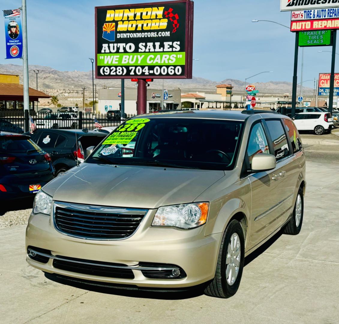 2015 gold Chrysler Town & Country (2C4RC1BG8FR) , located at 2190 Hwy 95, Bullhead City, AZ, 86442, (928) 704-0060, 0.000000, 0.000000 - 2015 Chrysler town and country . Loaded . Seats7 . Bluetooth , backup camera . Free warranty , we finance . drop down tv with dvd player. headphone sets. Michelin tires. v6 automatic . Top of the line van. Fully loaded. - Photo#2